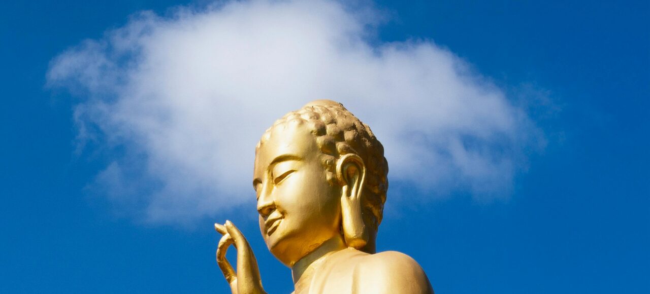 India Buddhist pilgrimage tour banner featuring sacred Buddhist sites, Buddha statue and spiritual travel across India